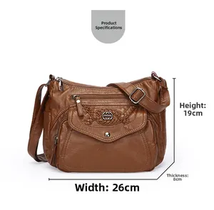 Detailed size chart of brown soft leather crossbody bag with multi-pocket design