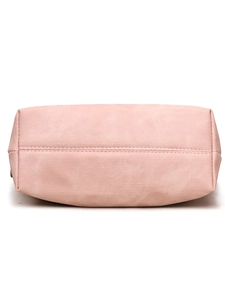 Gros plan du fond en toile rose renforcée d'un grand sac bandoulière de haute qualité