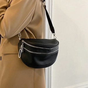 Litchi pattern leather crescent bag with double silver zippers and wide fabric strap