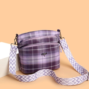 Purple plaid crossbody bag with kangaroo logo and wide geometric shoulder strap