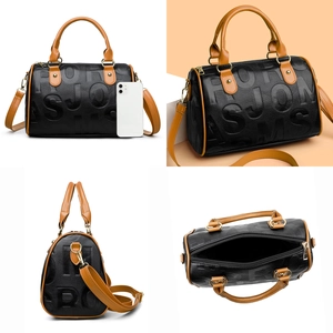 Boston style leather handbag in black and brown with embossed letters and gold hardware