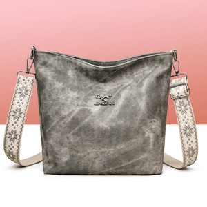 Sac bandoulière en toile grise lavée avec large sangle à motifs et logo JINGPIN