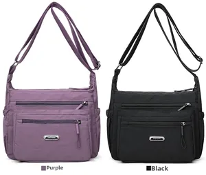 Nylon crossbody bags in purple and black colors with multi-zipper pocket design