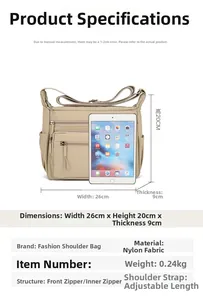 Detailed view of nylon shoulder bag dimensions 26x20x9cm with adjustable strap