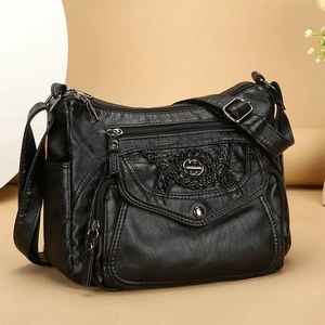 Versatile black PU leather crossbody bag with multiple zip pockets and lychee texture