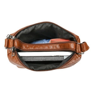 Brown PU leather crossbody bag with multiple zip compartments and large storage capacity