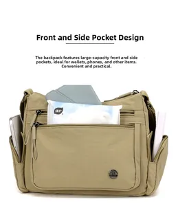 Detail showing high-capacity khaki oxford bag with multiple pockets for daily essentials