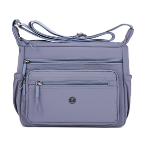Lightweight lavender blue nylon crossbody bag with multiple zip pockets and adjustable strap