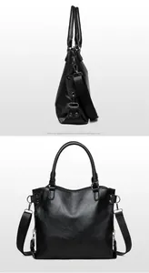 Detail view showing side and back of the black leather tote bag with silver metal studs