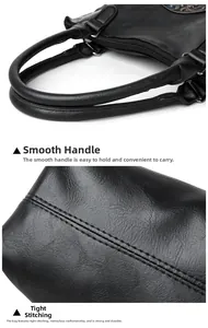 Detail of ergonomic round handle and durable multi-line stitching on black tote bag