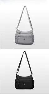 Détails de sacs bandoulière en nylon gris et noir avec poches zippées et bandoulière réglable