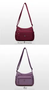 Détail de sacs bandoulière en nylon imperméable bordeaux et violet avec plusieurs poches zippées