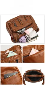 Detail view of large capacity brown crossbody bag showing multiple pockets and storage space