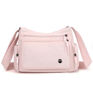 Light pink multi-pocket oxford crossbody bag with adjustable strap and silver logo
