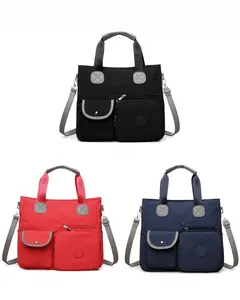 Drei Farben strapazierfähiger Nylon-Tragetaschen mit mehreren Taschen und Riemen