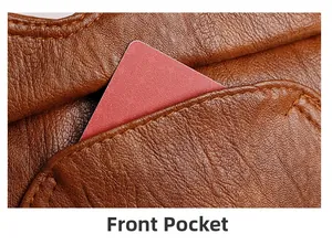 Detail of front pocket on brown litchi pattern leather bag with fine stitching