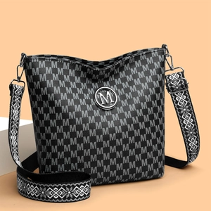 Sac fourre-tout vintage noir en cuir avec imprimé M blanc et bandoulière géométrique