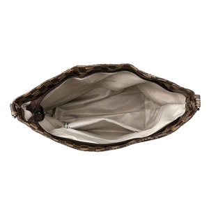 Vue de dessus de l'intérieur du grand sac vintage avec extérieur à motifs et poche