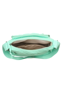 Macro view of mint green nylon crossbody bag showing multiple pockets and inner compartment