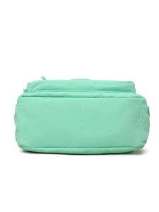 Detail view showing reinforced double stitching on the mint green waterproof nylon bag base