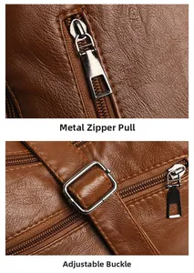 Detail of brown litchi pattern leather with metal zipper and adjustable buckle