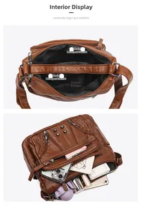 Internal view of the brown leather shoulder bag showing multiple compartments and storage