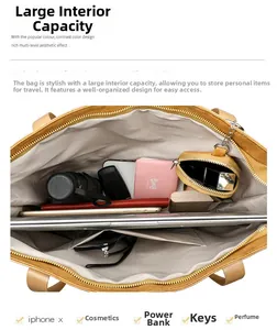 Interior view of large capacity tote bag showing compartments for laptop and daily essentials