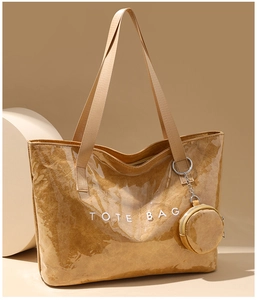 Detail of waterproof tote bag with crinkled texture, thick straps and small coin purse