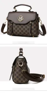 Detail view showing side and profile angles of a brown vintage monogram handbag