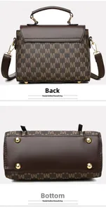 Detail view of the patterned brown handbag showing the back side and gold studded bottom