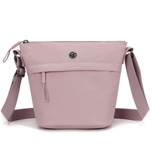 Minimalist lotus pink nylon bucket crossbody bag with adjustable strap and metal logo