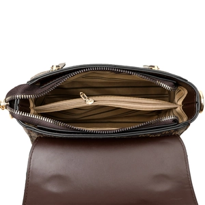 Top-down view of handbag interior with striped lining and gold-zippered compartment