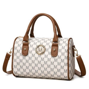 Vintage Boston handbag with ivory M-pattern print, brown leather handles, and gold accents