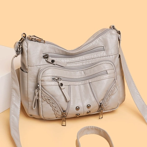 Minimalist light grey multi-layer crossbody bag with soft PU leather and rivet details