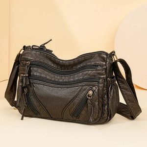Vintage dark brown crossbody bag with multi-layer zipper pockets and soft leather texture