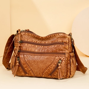 Brown vintage faux leather crossbody bag with multiple zippers and large capacity