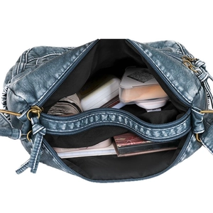 Crossbody bag in vintage blue with multiple zipper pockets and large capacity interior