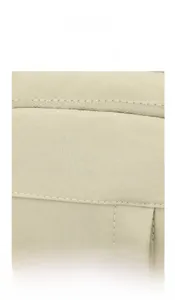Detail of minimalist canvas bag featuring embossed New Dreams logo and smooth resin zipper