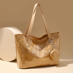 Brown Dupont paper tote bag with TOTE BAG print and matching round coin purse