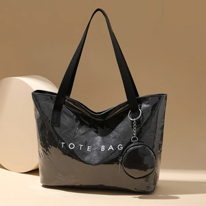 Large black glossy tote bag with TOTE BAG print and round coin purse for daily commute