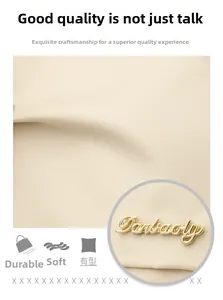 Close-up of beige nylon fabric with golden Darbaoly logo showing soft durable texture