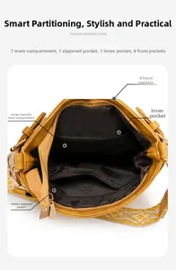 Interior view of ginger yellow PU handbag showing main compartment and ethnic woven strap