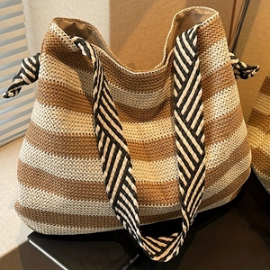 Striped straw beach tote bag with woven texture and large capacity for summer travel