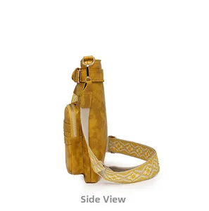 Side view of ginger yellow PU leather crossbody bag featuring geometric jacquard strap