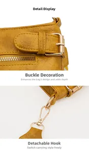 Detail view of yellow lychee grain leather bag with gold buckle and detachable hook