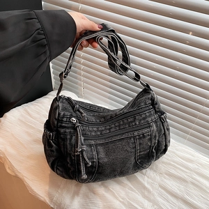 Sac fourre-tout en denim délavé vintage avec plusieurs poches et bandoulière