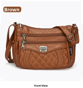 Front view of brown quilted leather crossbody bag with multiple zipper compartments