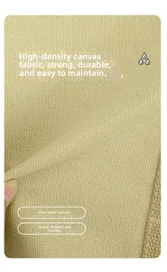 Macro shot showing high-density khaki canvas fabric texture and durable woven material