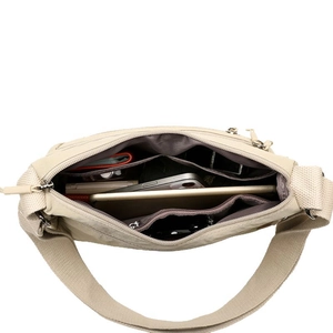 Minimalist cream beige crossbody tote bag with large capacity and organized interior pockets