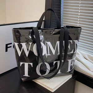 Glossy black tote bag with white Women Tote lettering and dual webbing handles